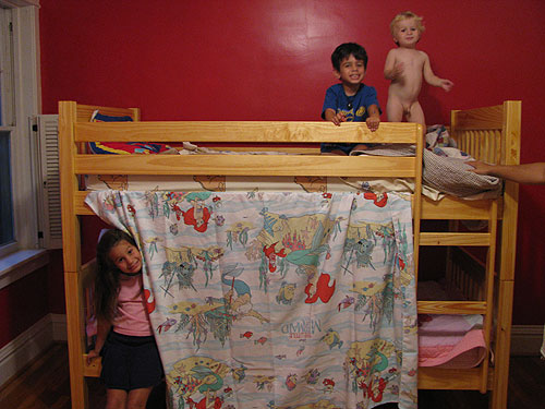 when the new beds arrived, anthony tried to lay claim to the upper bunk by rolling naked in it. he didn't know this ploy only works in a house where people are clothed more often than they are naked.